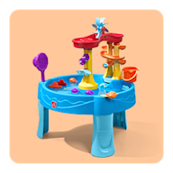 Kids playing at a sand and water table