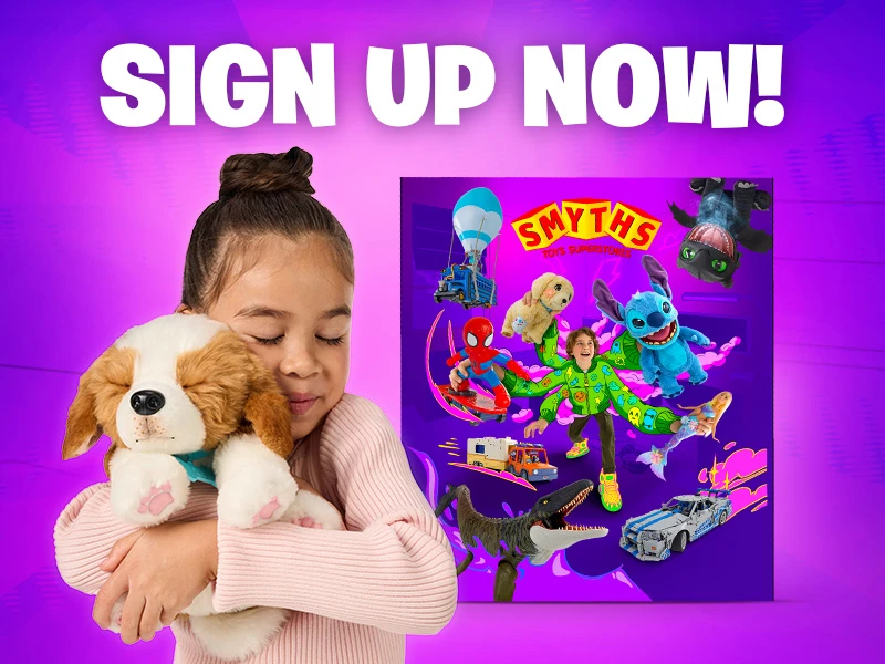 A girl hugging a puppy toy with the Smyths Toys Superstores toy catalogue 2025 in the background.